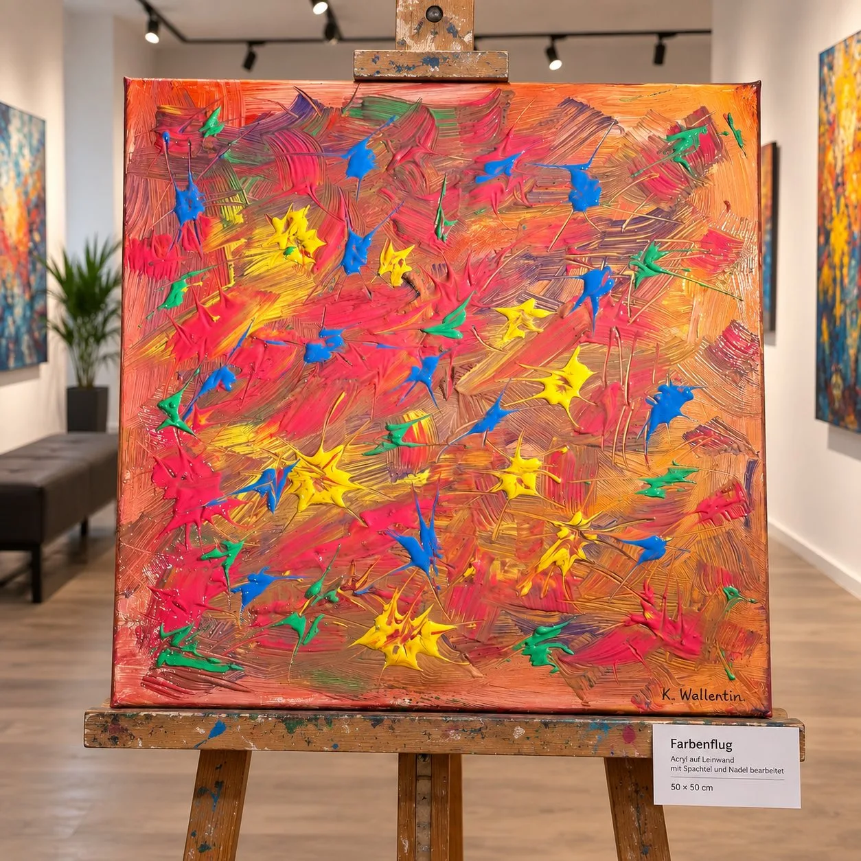 Werk Nr. 16 – Farbenflug – auf der Staffelei in einer Galerie